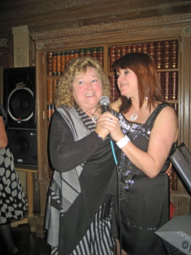 June and Carole ...singing at the Toby one Christmas..